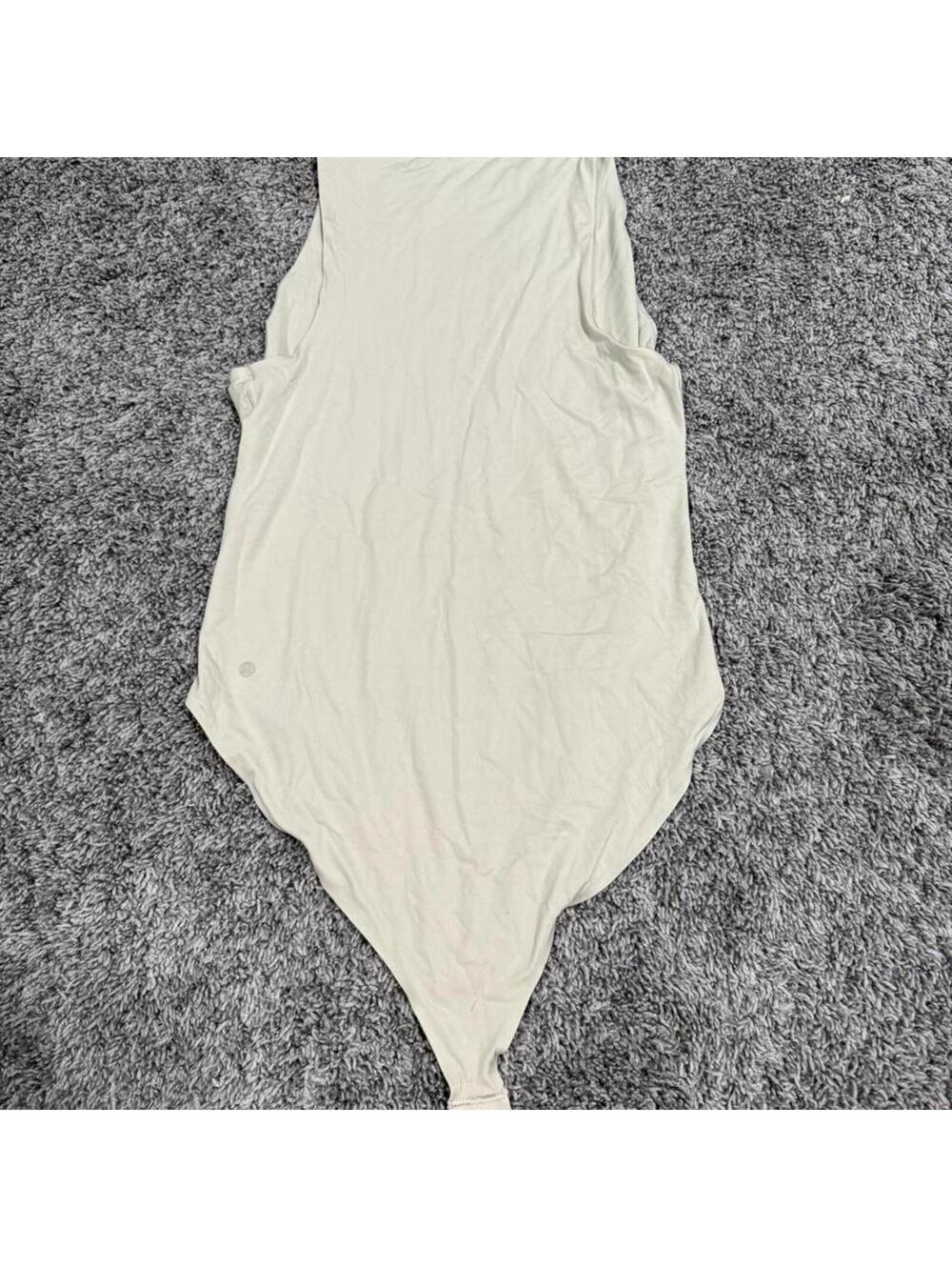 Lululemon Beige Sleeveless Bodysuit with Snap Closure